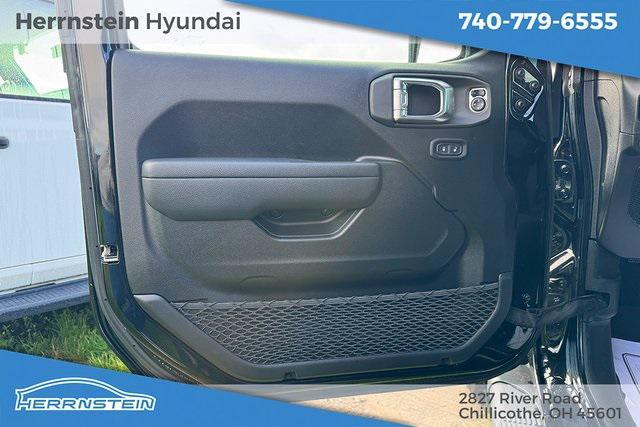 used 2024 Jeep Wrangler car, priced at $34,133