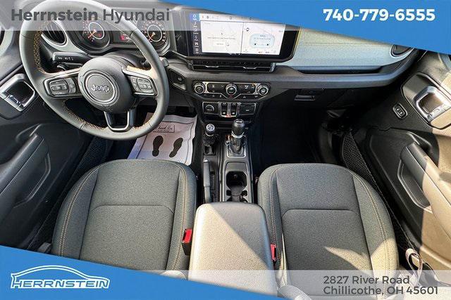 used 2024 Jeep Wrangler car, priced at $34,133
