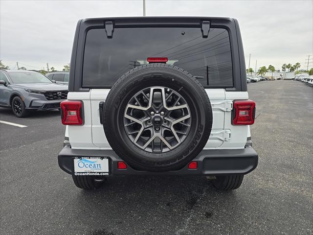 used 2024 Jeep Wrangler car, priced at $42,878