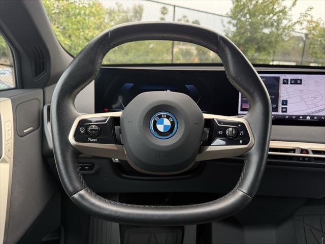 used 2024 BMW iX car, priced at $62,744