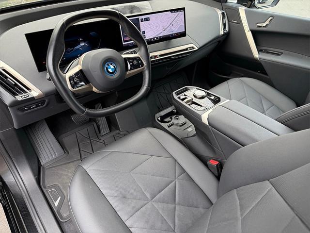 used 2024 BMW iX car, priced at $58,872
