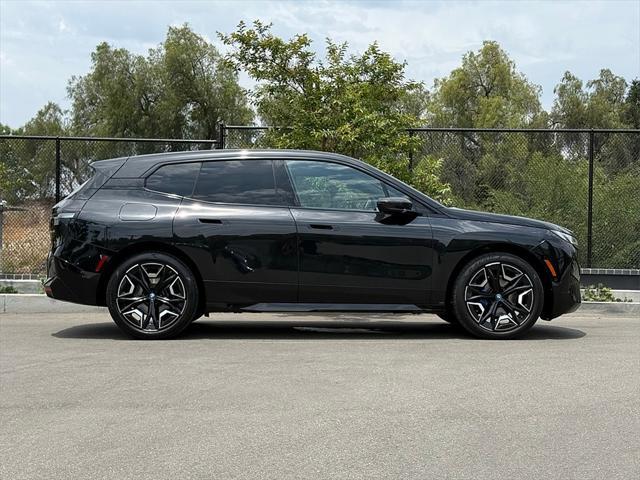 used 2024 BMW iX car, priced at $58,872