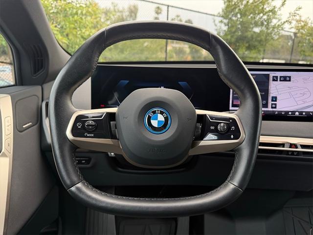 used 2024 BMW iX car, priced at $58,872