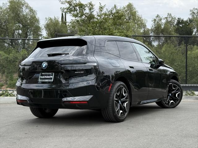 used 2024 BMW iX car, priced at $62,744