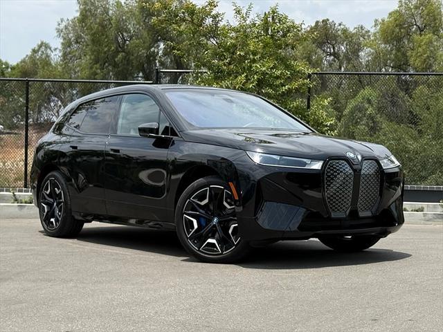 used 2024 BMW iX car, priced at $58,872