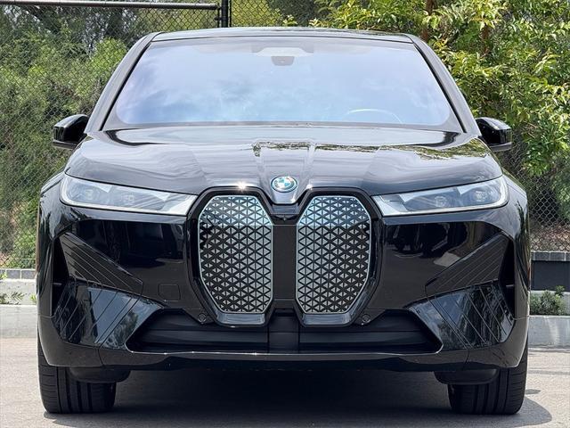 used 2024 BMW iX car, priced at $58,872