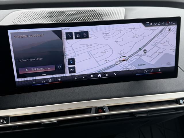 used 2024 BMW iX car, priced at $62,744