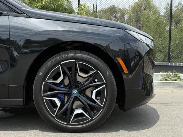 used 2024 BMW iX car, priced at $62,744