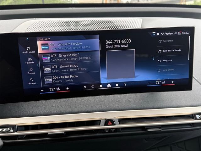 used 2024 BMW iX car, priced at $58,872