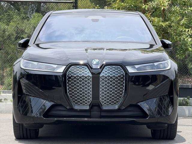 used 2024 BMW iX car, priced at $62,744