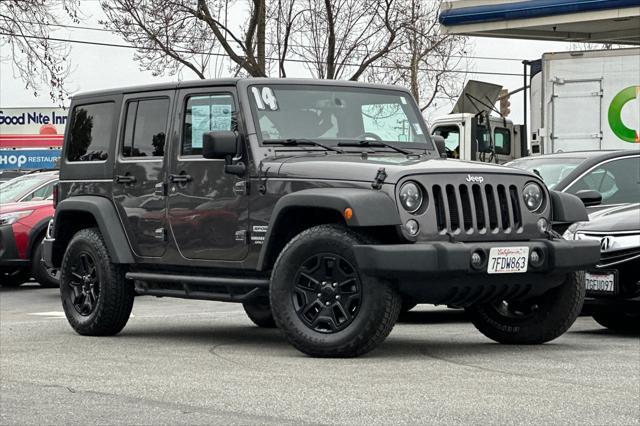 used 2014 Jeep Wrangler Unlimited car, priced at $17,888