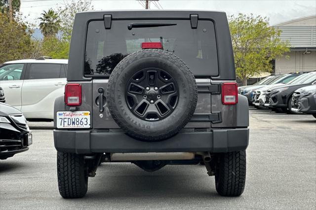 used 2014 Jeep Wrangler Unlimited car, priced at $17,888