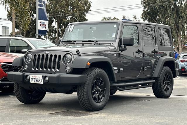 used 2014 Jeep Wrangler Unlimited car, priced at $17,888