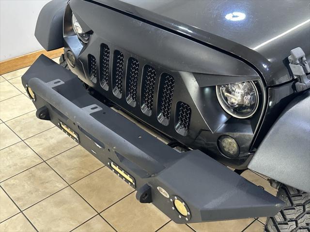 used 2016 Jeep Wrangler Unlimited car, priced at $21,995