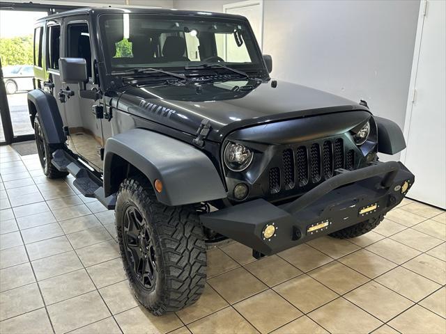 used 2016 Jeep Wrangler Unlimited car, priced at $21,995