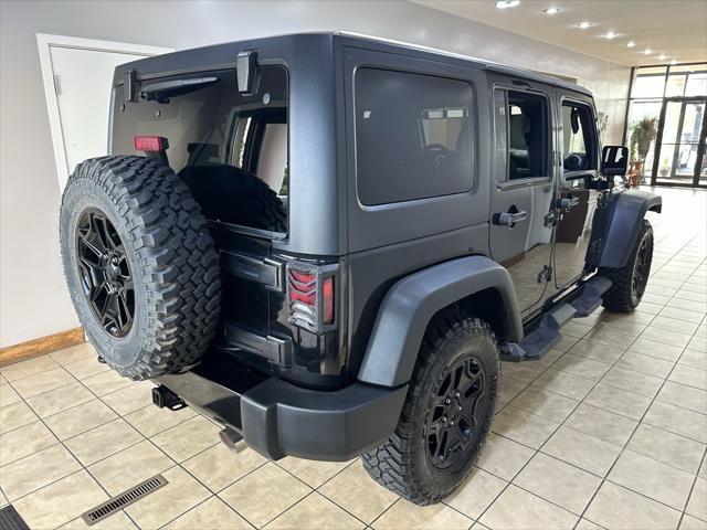 used 2016 Jeep Wrangler Unlimited car, priced at $21,995