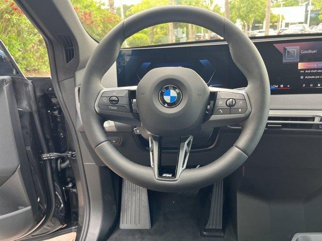 new 2025 BMW iX car, priced at $101,095