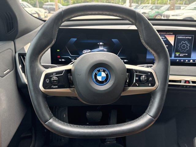 used 2024 BMW iX car, priced at $53,621