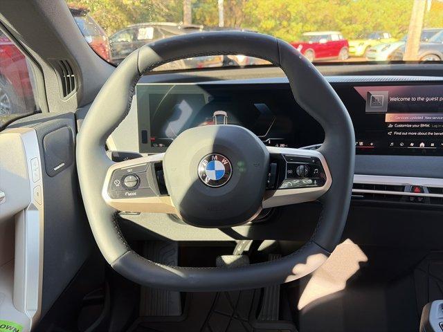 new 2026 BMW iX car, priced at $87,245