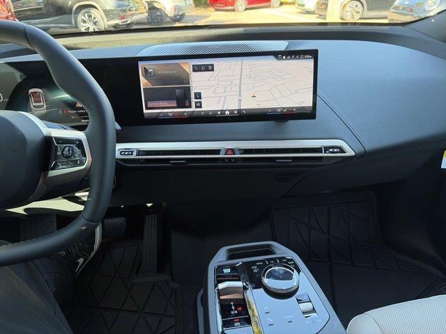 new 2026 BMW iX car, priced at $87,245