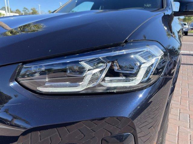 used 2023 BMW X4 car, priced at $57,929