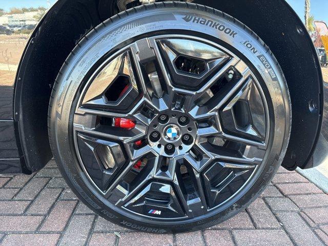 new 2026 BMW iX car, priced at $91,895