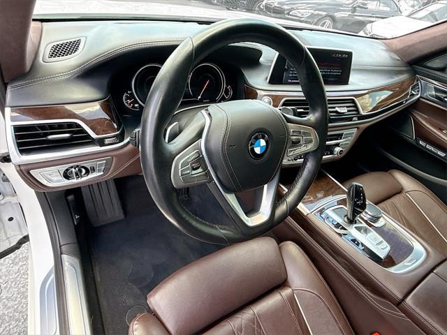 used 2016 BMW 750 car, priced at $23,029