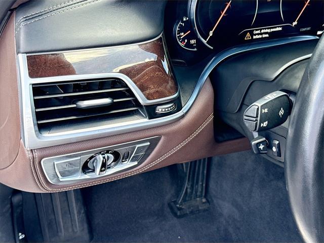 used 2016 BMW 750 car, priced at $23,029