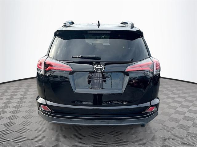 used 2018 Toyota RAV4 car, priced at $16,009