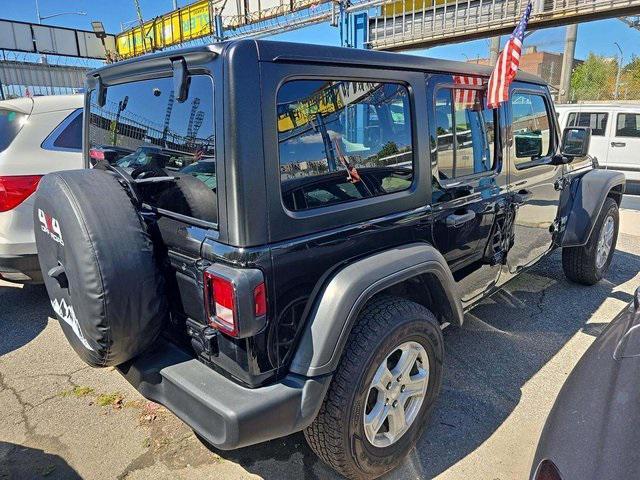 used 2021 Jeep Wrangler Unlimited car, priced at $15,493