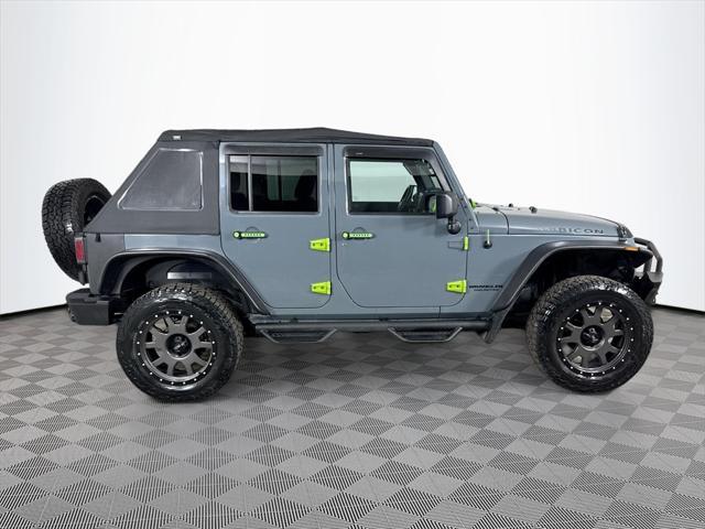 used 2014 Jeep Wrangler Unlimited car, priced at $16,513