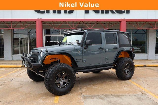 used 2014 Jeep Wrangler Unlimited car, priced at $17,979