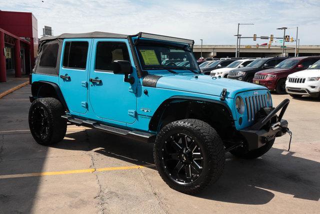 used 2018 Jeep Wrangler JK Unlimited car, priced at $23,988