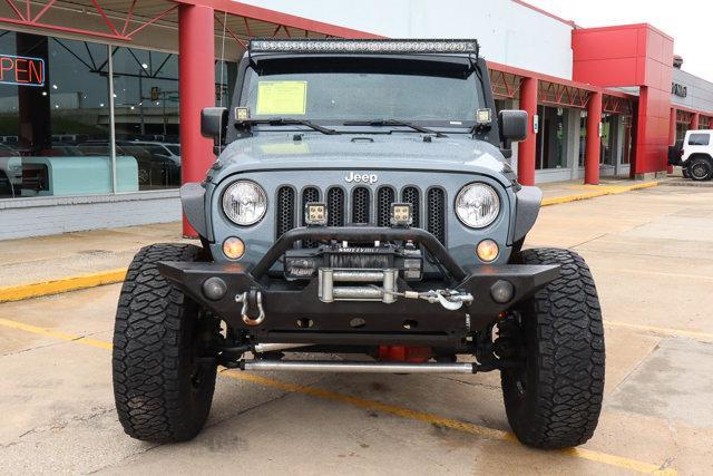 used 2014 Jeep Wrangler Unlimited car, priced at $19,979