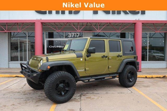 used 2010 Jeep Wrangler Unlimited car, priced at $19,979