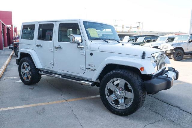 used 2012 Jeep Wrangler Unlimited car, priced at $20,479