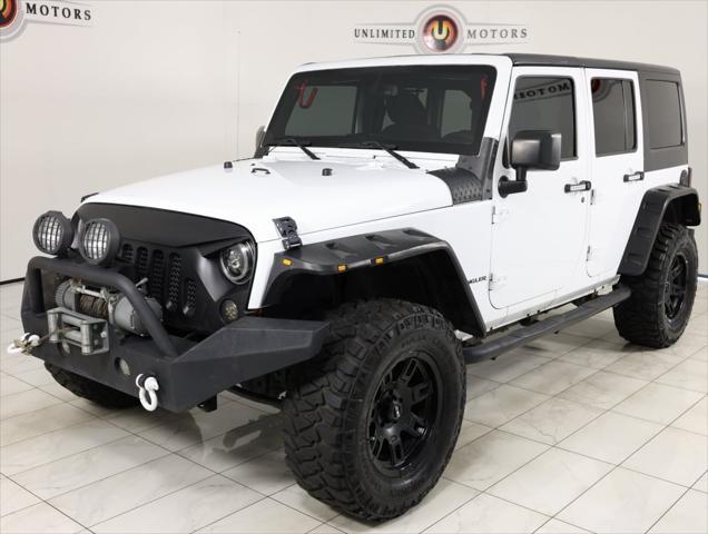 used 2015 Jeep Wrangler Unlimited car, priced at $13,995