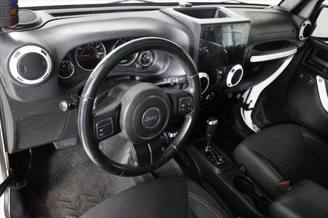 used 2015 Jeep Wrangler Unlimited car, priced at $13,995