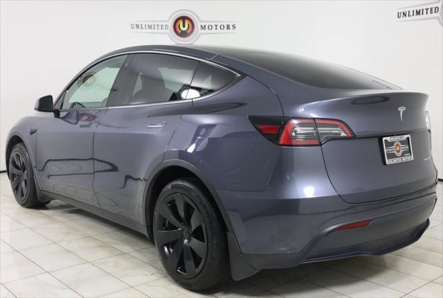 used 2023 Tesla Model Y car, priced at $31,995