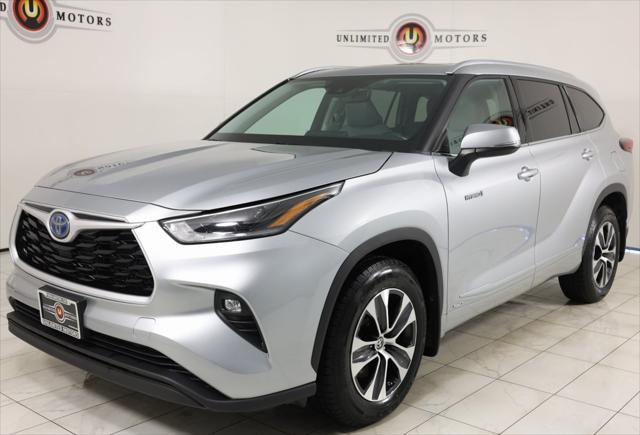 used 2021 Toyota Highlander Hybrid car, priced at $32,995