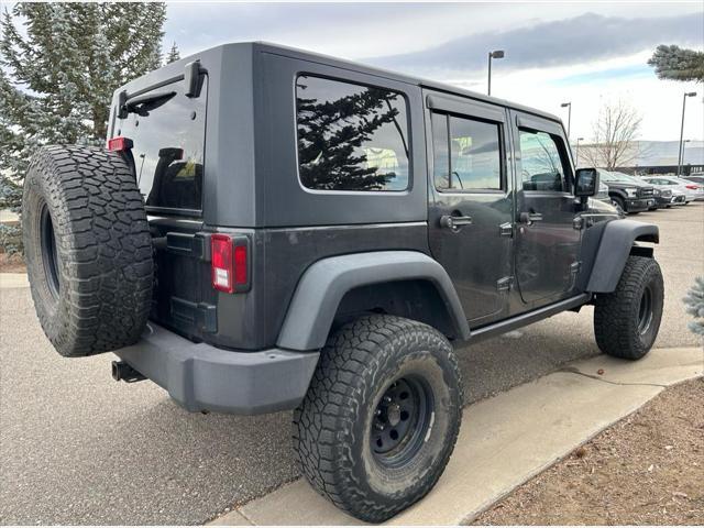 used 2010 Jeep Wrangler Unlimited car, priced at $11,998