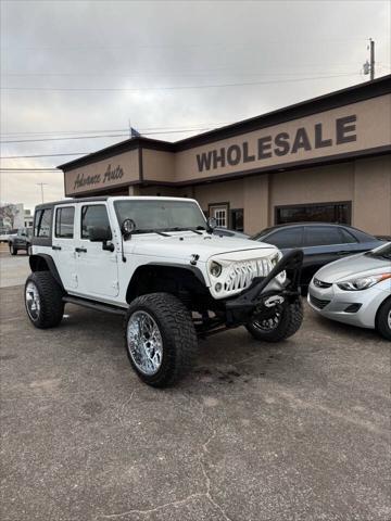 used 2012 Jeep Wrangler Unlimited car, priced at $14,988