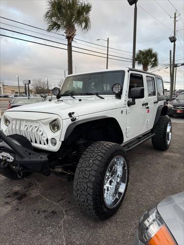 used 2012 Jeep Wrangler Unlimited car, priced at $14,988