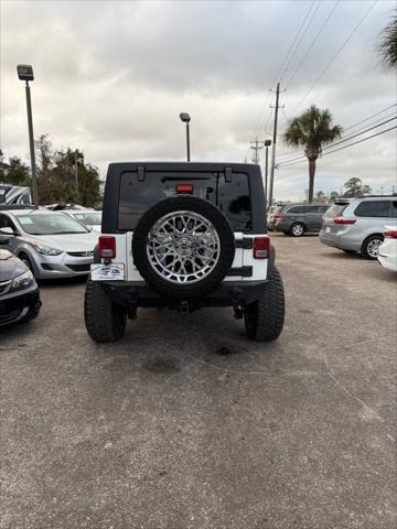 used 2012 Jeep Wrangler Unlimited car, priced at $14,988