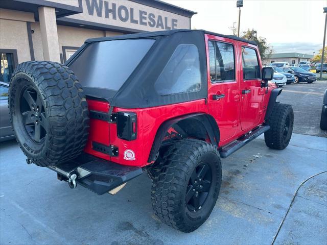 used 2015 Jeep Wrangler Unlimited car, priced at $13,988