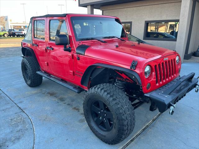 used 2015 Jeep Wrangler Unlimited car, priced at $13,988