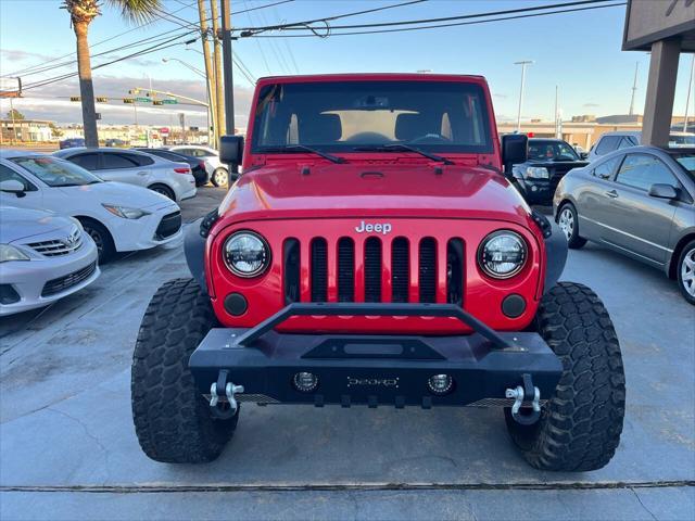 used 2015 Jeep Wrangler Unlimited car, priced at $13,988