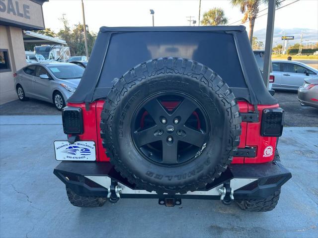 used 2015 Jeep Wrangler Unlimited car, priced at $13,988