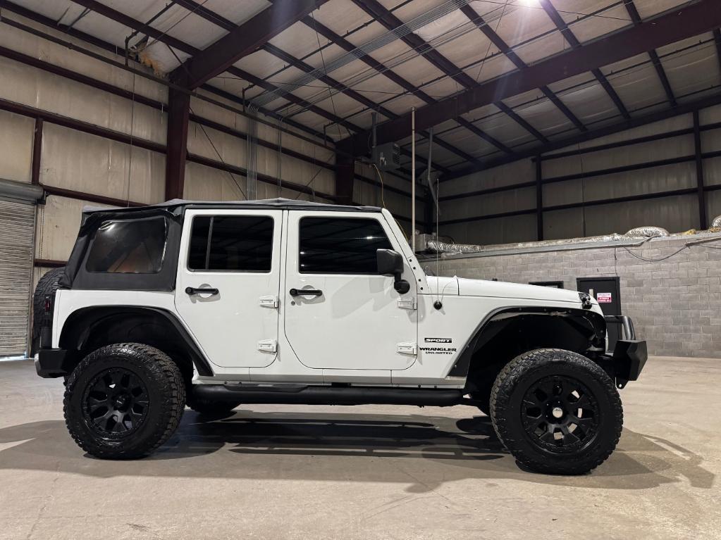 used 2013 Jeep Wrangler Unlimited car, priced at $9,999