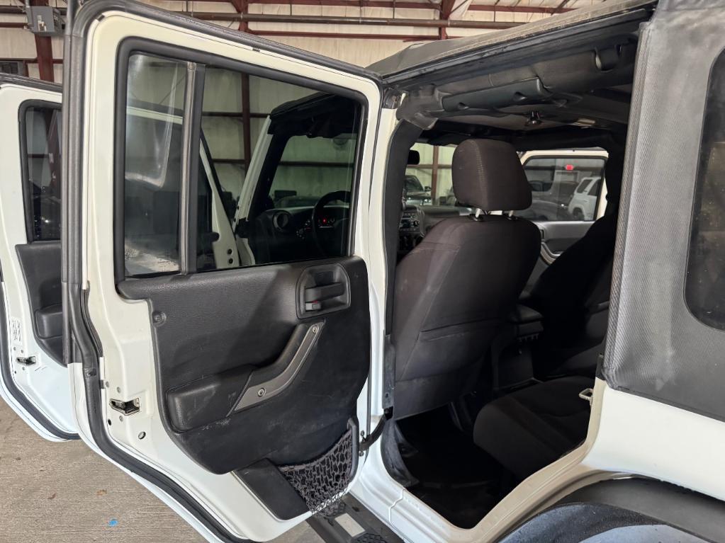 used 2013 Jeep Wrangler Unlimited car, priced at $9,999